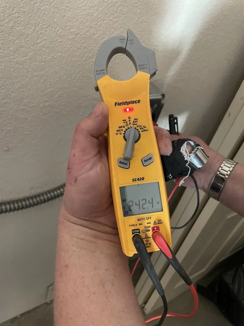 Voltage testing with clamp meter during Circuit Breaker Repair in Waterbury